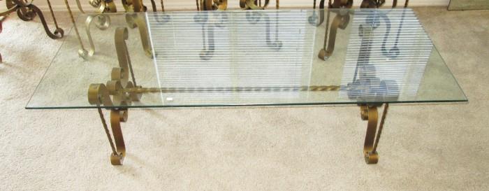Glass coffee table (Thick Glass) Nice metal frame holding the glass.