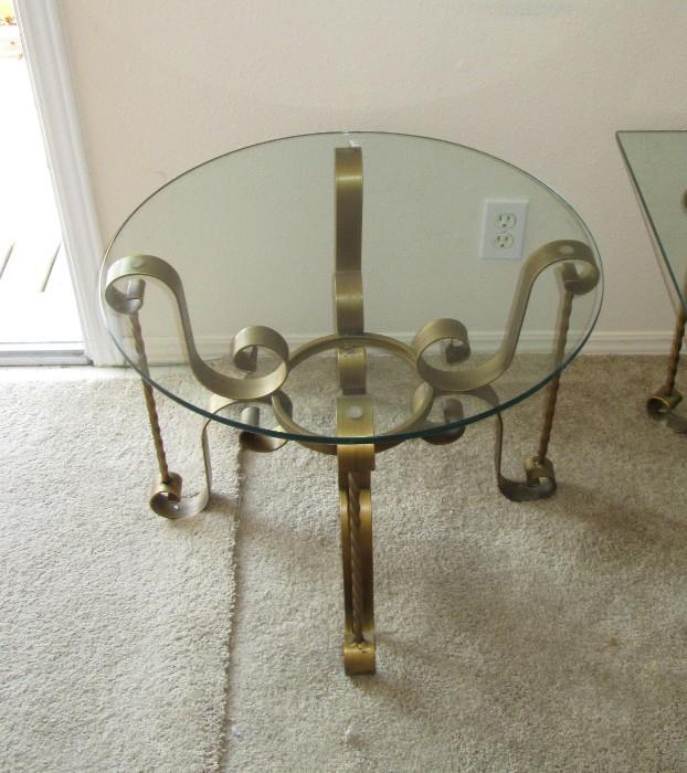 Glass round table (Thick Glass) Nice metal frame holding the glass.