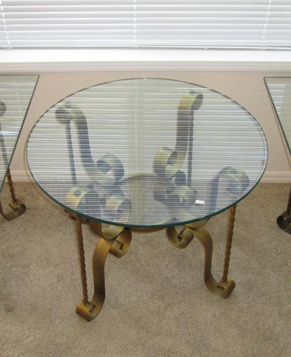Glass round table (Thick Glass) Nice metal frame holding the glass.