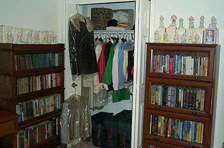 2 Barrister bookcases (1 old, 1 newer), Richland Furs fur coats, books and Precious moments.