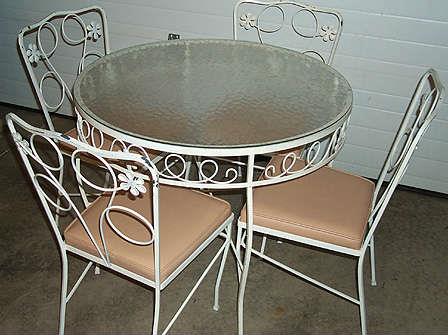 Wrought iron 36 in. diameter glass top patio table and chairs