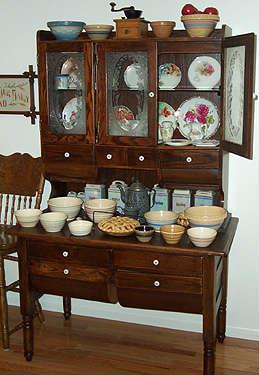 Kitchen cabinet, cannister set, various bowls, coffee grinder, etc...