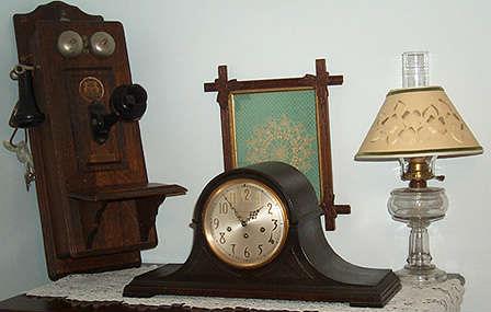 Wall telephone, mantle clock