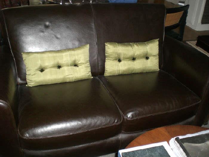 Handsome Full leather love seat..