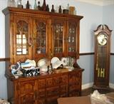 Display cabinet, glassware, old bottles, grandfather clock