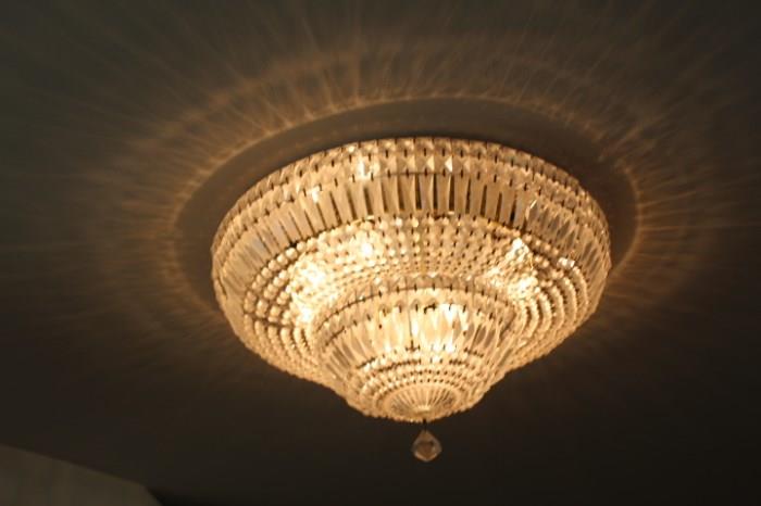 A Ceiling Chandalier that makes the whole room glow, and there is a pair!