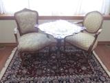 arm chairs, occasional table, area rug