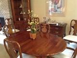 Dining room table, 8 chairs, 3 leaves, table pad, matching buffet and corner cabinet.