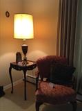Arm chair, antique side table,  vintage lamp
