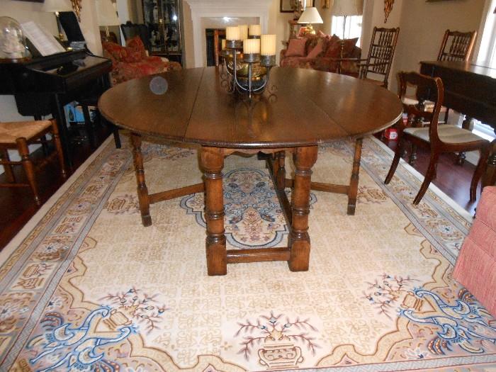 Different view of dining table w/leaves opened