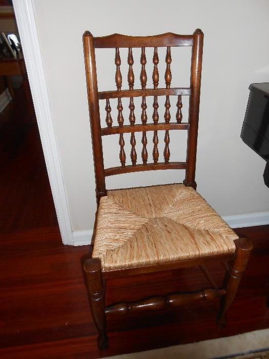 One of six straight backed chairs w/drop-leaf dining room table