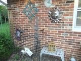 Lots of Out door Decor, Shepherd hooks, cast iron end tables, wall art, pots, windchimes, etc.