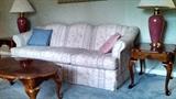Sofa with matching love seat made in N.C. Solid and in Excellent condition. Coffee table and 2 end tables also in like new condition.All priced 2 sell.