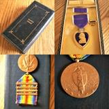 WW II Purple Heart Medal in original box with presentation card and letter;  WW I Victory Medal with four battle bars