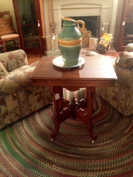 Eastlake Parlour Table atop a great Oval Rug