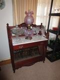 Marble top server; pink Fenton lamp
