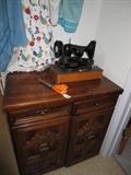 Featherweight Singer and sewing cabinet