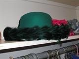 Green feather trimmed felt hat