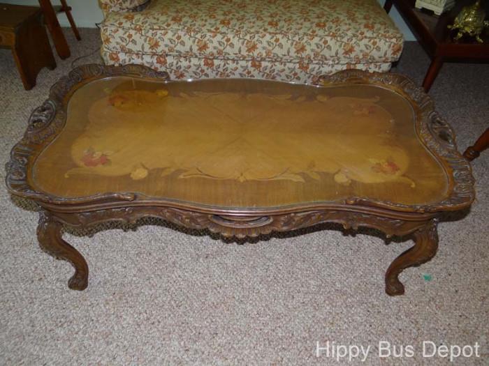 Antique Carved Coffee table with inlay wood and glass top