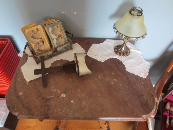 stereoscope, marble top table