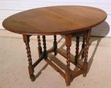 Antique English oak barley twist drop leaf table