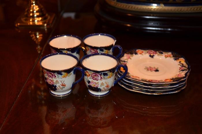 Coffee set. Small enough to be a doll's tea set. Beautiful blue with flowers. $8.00
