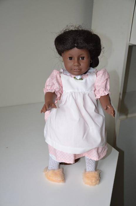 Addy Walker, American Girl Doll. Never loved by a little girl. Waiting for adoption. $25.00. With extra dresses, $10 each.