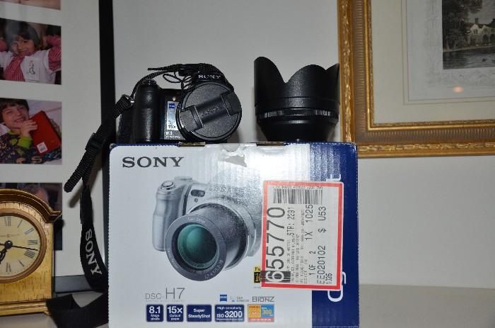 Loads of camera equipment. Entire black & white darkroom set w/enlarger. This barely used SONY CyberShot #SC-H7 Digital Camera 15x Zies lens. Light wait. Good travel camera. $75.00. Other nikon lenses.