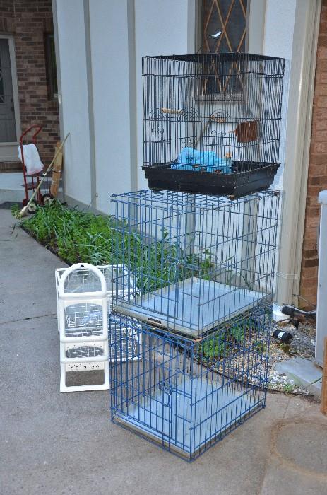 Here we have 2 dog crates (Sunday price $12.00 each). Very clean. Also 2 bird cages. One shown here is quite large. Large enough to accommodate a small parrot or 2 birds comfortably (Sunday price $12).