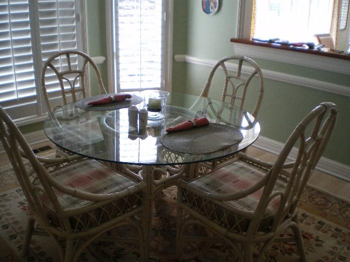 nice kitchen table & 4 chairs with chair pads, wicker & glass