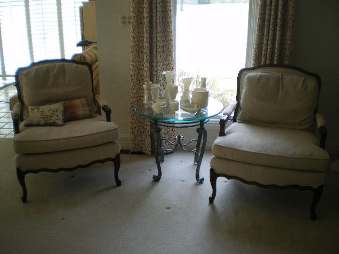 PAIR OF WALNUT CARVED CHAIRS, GLASS TABLE WITH BELLEEK PIECES ON TABLE
