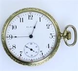 Circa 1909 17-jewel Elgin open-face pocket watch in a gold-plated case from Illinois Watch Case Company: 1 7/8" diameter. Watch is running. Please preview for details & condition.