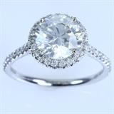 New 18K white gold diamond ring with ~2.31 ctw in diamonds; a ~2.02 round brilliant center diamond (SI3 clarity, I color) & ~0.29 ctw in round brilliant accent diamonds (I1 to I2 clarity, H to I color): size 6 1/4, 3.2 gms gross weight. Center diamond certified in 2014 by E.G.L. (European Gemological Laboratory) .