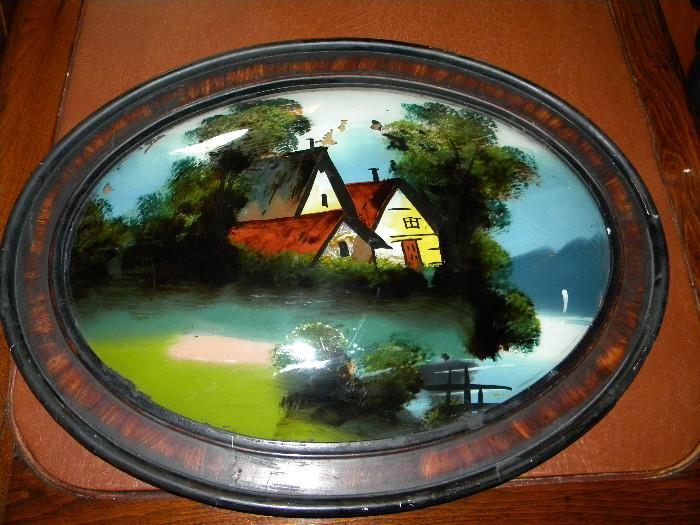 Antique Oval Painting on Convex Glass (one photo with the flash and one without).