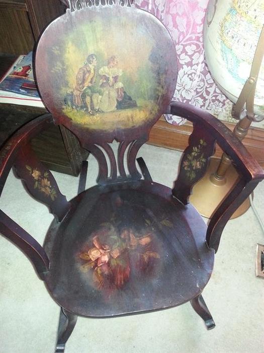 This is a beautiful hand painted antique chair