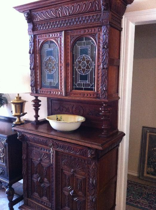 exceptional antique cabinet with stained glass doors
