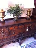                      intricately carved antique buffet