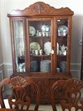     china cabinet has matching table, chairs, & server
