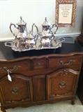                   silver service on dining room server