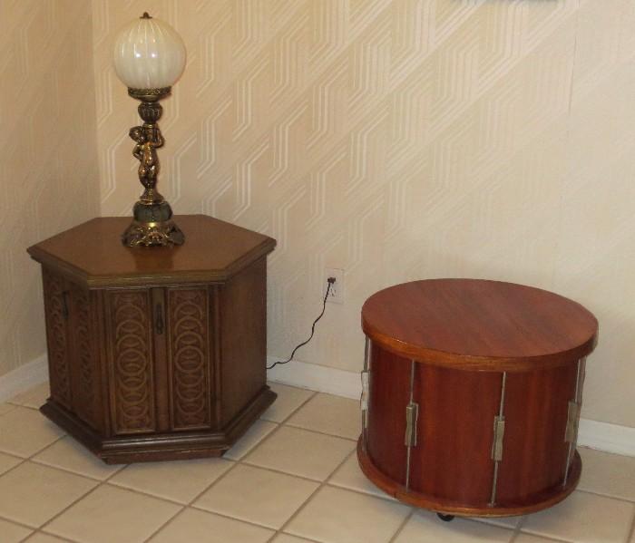Actual side table on wheels made from old wooden drum with cherub lamp and side table