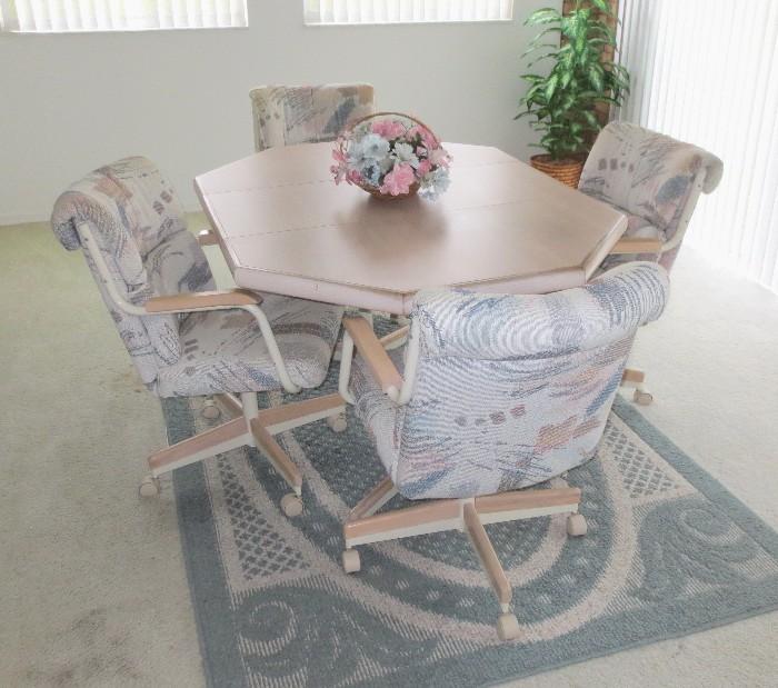 Nice kitchen dinette set with swivel castor chairs