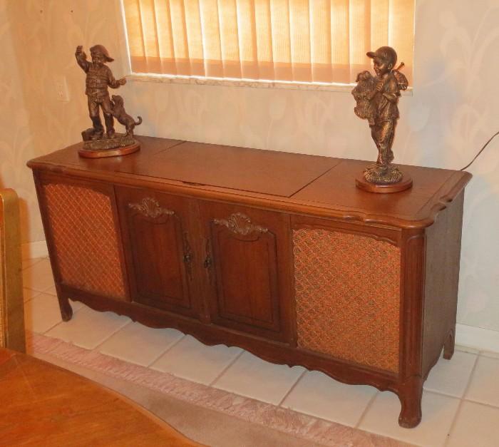 Stereo console cabinet with boy statues 