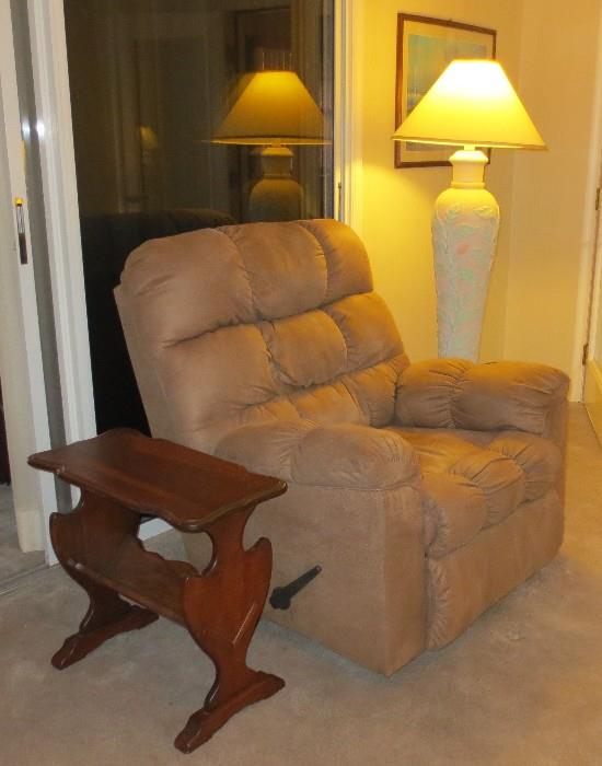 Large recliner with side table and floor lamp