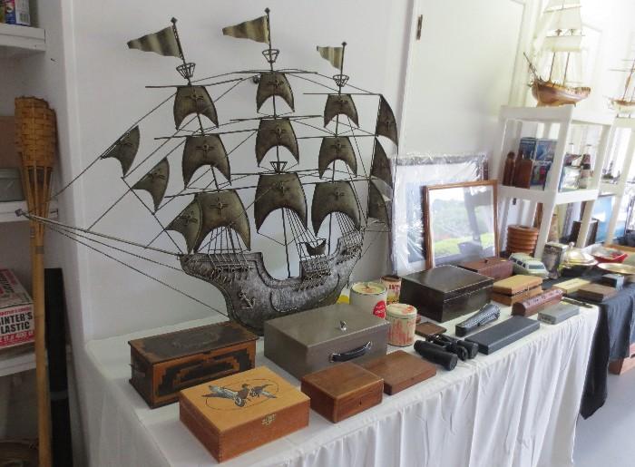Neat box and humidor collection with large metal ship wall hanging
