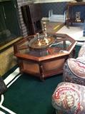 octagonal glass-top coffee table