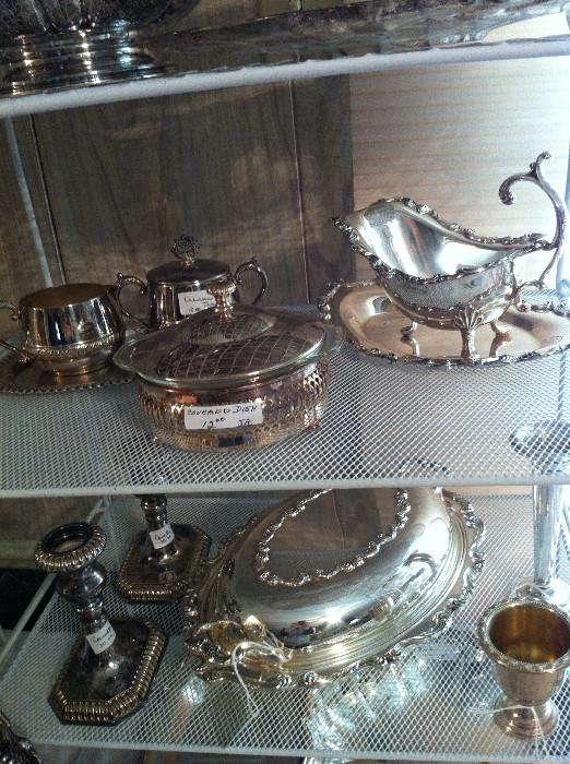             large selection of silver plate serving pieces
