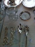 large selection of silver plate serving pieces