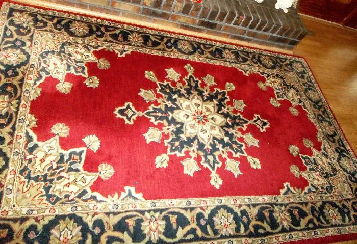 Beautiful 5' x 8' (+/-) area rug...crisp colors; no bleeding of color or damage observed.