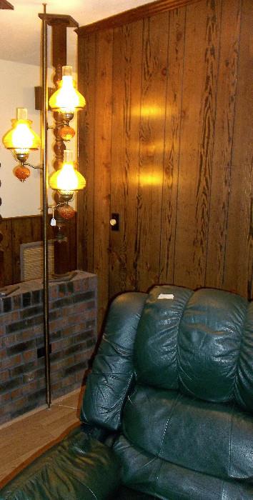 Mid-century pole lamp...nice amber glass shades with clear chimneys.  (note:  this is same chair!)    The true color is somewhere between this color and that color...go figure!)