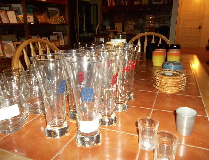Several lots of unusual glassware!  Lots of mug sets! Excellent oak tile topped table with arrow back chairs.